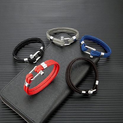Pulsera de Cuero Azul Marino Trenzado Multicapa – Unisex, con Grillete en U de Acero Inoxidable