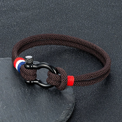 Pulsera Tejida de Doble Capa con Hebilla de Grillete Negro – Unisex, Diseño Artesanal con Detalle de Bandera Francesa